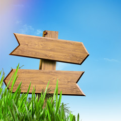 Wooden sign over abstract natural backgrounds