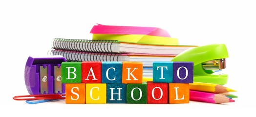 Colorful Back to School wooden toy blocks with school supplies over white background