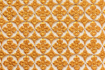 Pattern of Golden buddhist temple wall in Thailand