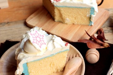 White cream cake delicious on wood background