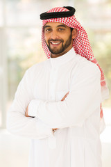 islamic man standing indoors