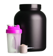 big tub of whey protein with pink shaker and cup of protein powd