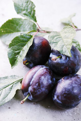 plum on a metal table