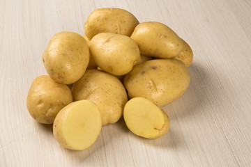Some potatoes over a white background
