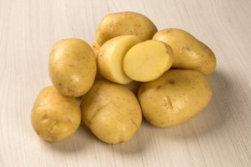 Some potatoes over a white background