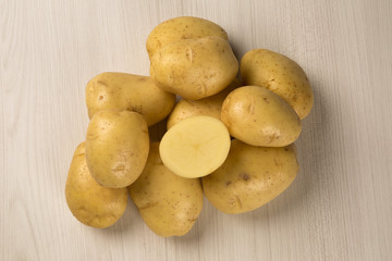 Some potatoes over a white background