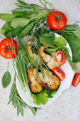 fish with vegetables and herbs