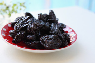 healthy prunes on a plate