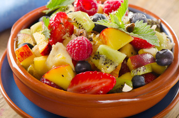 Healthy homemade fruit salad with mint.