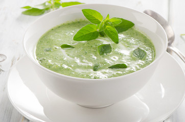Creamy vegetable soup with fresh herbs.