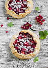 berry pie on a light wooden background
