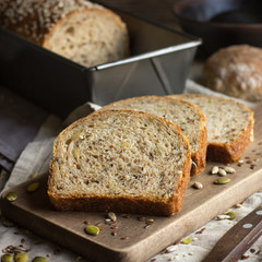 fresh  multigrain bread on rustic background