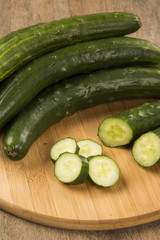 Fresh cucumber on the wooden table