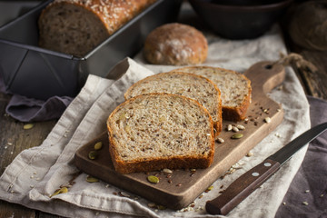 fresh  multigrain bread on rustic background