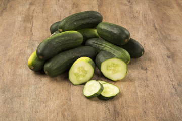 Fresh cucumber on the wooden table