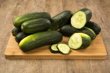 Fresh cucumber on the wooden table