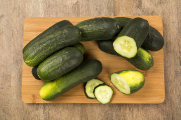 Fresh cucumber on the wooden table