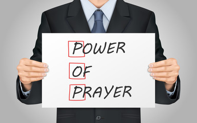businessman holding Power Of Prayer poster