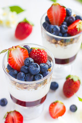 dessert with  berries,  cream cheese, granola  and berries  jam