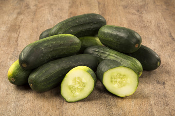 Fresh cucumber on the wooden table