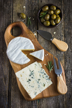 camembert and blue cheese  on cutting board