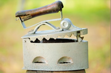 Old clothes iron, work with coals