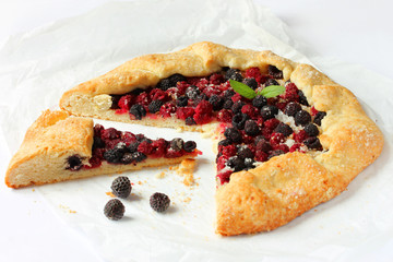 Simple French cake with raspberries on a white background