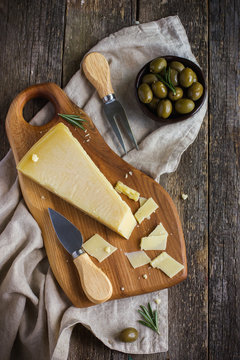 parmesan cheese on woden cutting board