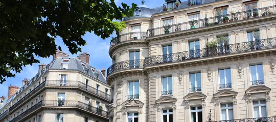 Foto op Canvas Parijs / Gevels van Haussmann-gebouwen © Brad Pict