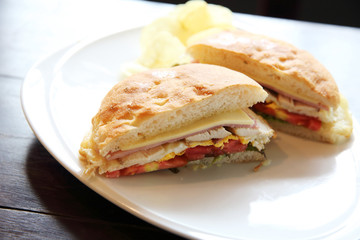 Club sandwich with on wood background