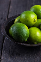 Organic limes on table