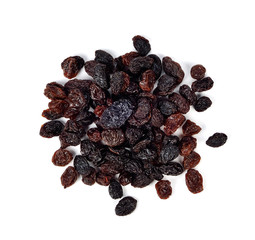 Pile of raisins on white background.