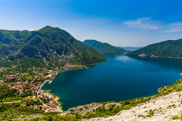 Fototapeta na wymiar Montenegro seashore, Bay of Kotor / Beautiful landscape with Risan town ,sea and mountains. Montenegro