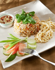 Fried rice with fresh vegetables and omelette. Delicious Thailand traditional food