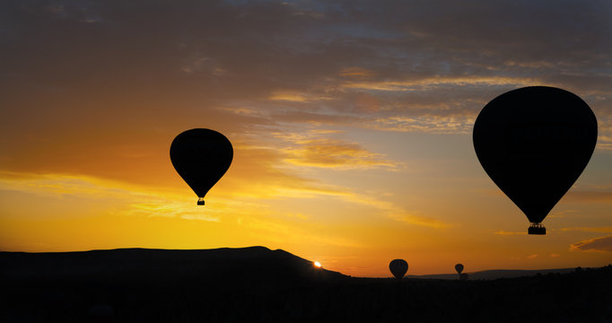 Balloons in Cappadocia at sunrise, Turkey