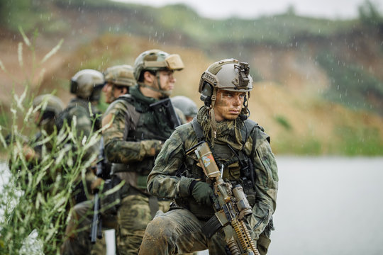 Portrait of a ranger in the battlefield with a gun