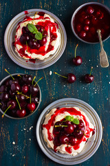 meringues pavlova cake with fresh cherry