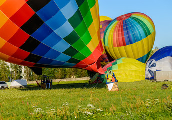 Fototapeta premium mass start of hot air balloons, taking off the hot air balloon