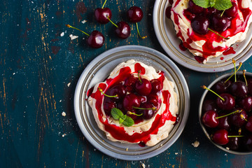 meringues pavlova cake with fresh cherry