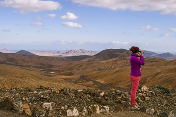 Fototapeta premium Female tourist in the mountains - Tenerife, Canary Island, Spain