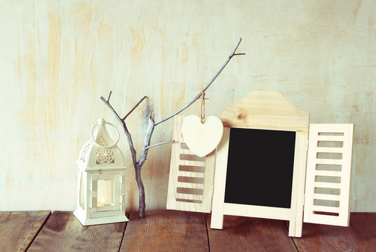 decorative chalkboard frame and wooden hanging hearts