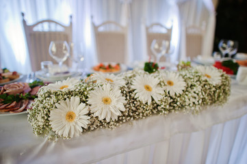 white flowers on wedding table