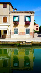 building architecture in Murano with reflection
