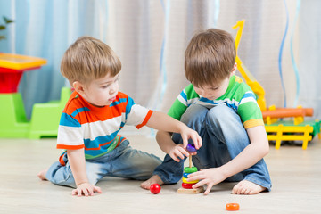 little children playing with toys