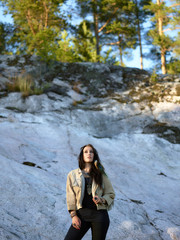 Naklejka premium Attractive young woman and feather headpiece