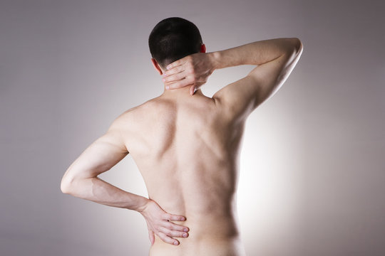 Man with backache. Pain in the man's body