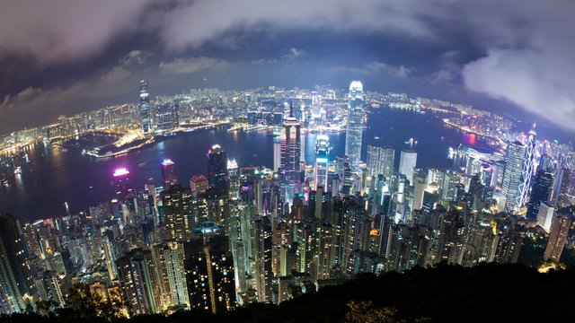 Tmelapse video of Hong Kong at night, fisheye view, zooming in