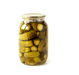 Salted cucumbers in a glass jar isolated on white