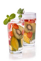Infused fresh fruit water kiwi, mango and strawberry.isolated ov