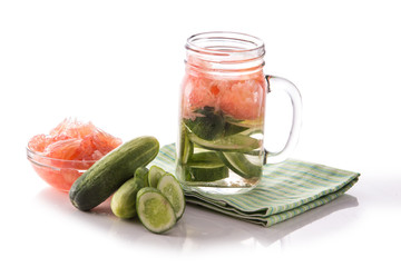 Infused fresh fruit water grapefruit and cucumber. isolated over